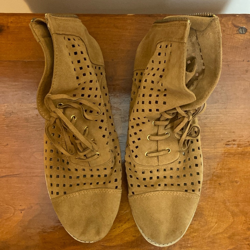 Bhava vegan suede booties with cut out pattern. Zip back and tie front